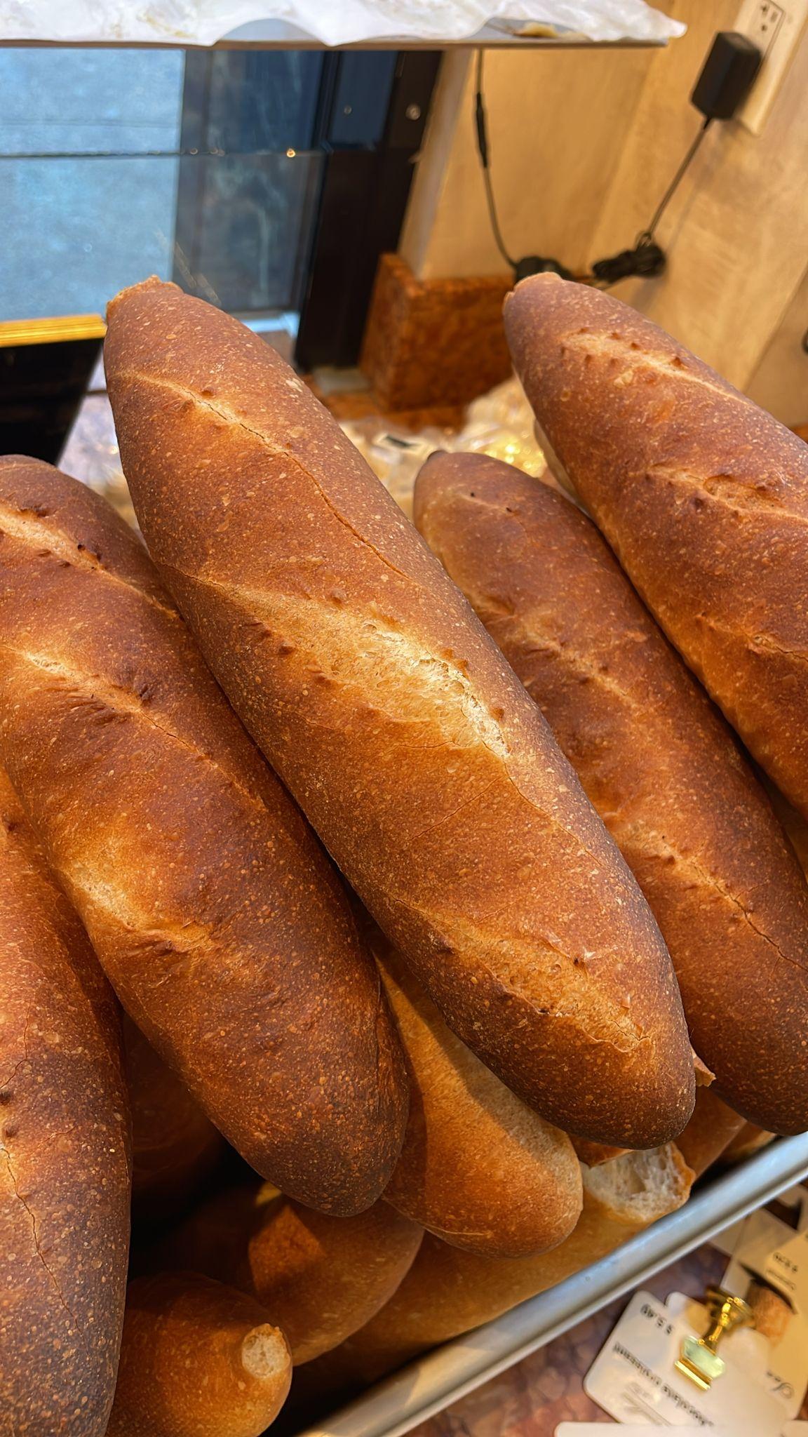 Aux Merveilleux de Fred - Midtown: Baguette, 1 x $2.50
Our signature Brioche bun filled with finely sliced Turkey and Swiss cheese, and complemented with salad and a mayo mustard mix. A moist, soft and balanced sandwich where bread is a star!