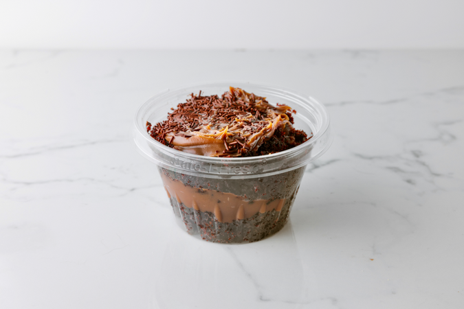 Brigadeiro Bakery: Cake Jar Chocolate , 1 x $10.00
Our most popular cakes conveniently packed so you can treat yourself on the go and anytime.

Chocolate Cake Jar: flour, sugar, cocoa powder, eggs, coconut milk, canola oil, baking powder, baking soda, dark chocolate, milk, corn starch, and chocolate sprinkles


Shelf life: 7 days refrigerated