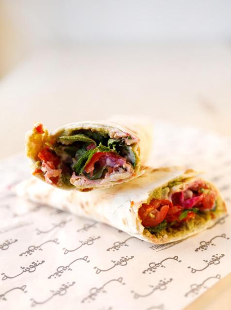 Manousheh: Falafel, 5 x $9.00
falafel pasted onto our flatbread and baked
to perfection, then topped with tomatoes, mint, pickled turnips, and tahini