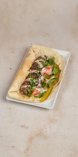 SALMA EAST VILLAGE: Kafta Kabab Sandwich, 1 x $16.50
Beef, gluten. Ground meat kneaded with house-blend spices & parsley