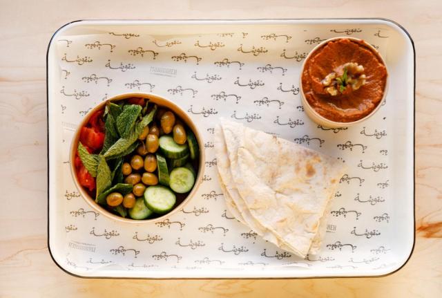 Manousheh: Muhammara Platter, 1 x $11.00
roasted red pepper dip with garlic, walnut, and pomegranate molasses