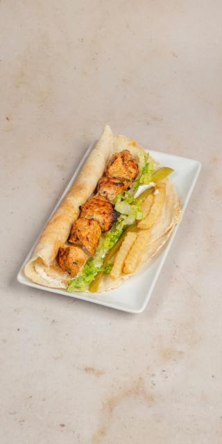SALMA EAST VILLAGE: Shish Tawouk Sandwich, 1 x $14.50
Gluten, poultry. Skinless boneless chicken breast cubes marinated in a special blend of spices