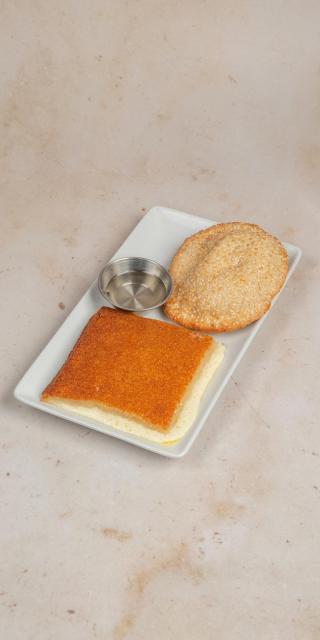 SALMA EAST VILLAGE: Knafeh, 1 x $12.50
Lactose. For the sweet tooth. Made with a shredded filo dough crust, a sweet cheese filling, and topped with a flavored simple syrup