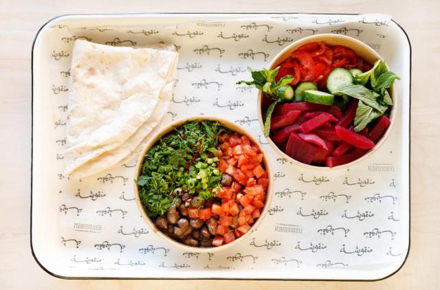 Manousheh: Foul, 2 x $12.00
slow-cooked fava beans mixed with garlic, 7 spice, and lemon juice, then topped with tomato, parsley, scallion, and drizzled with olive oil