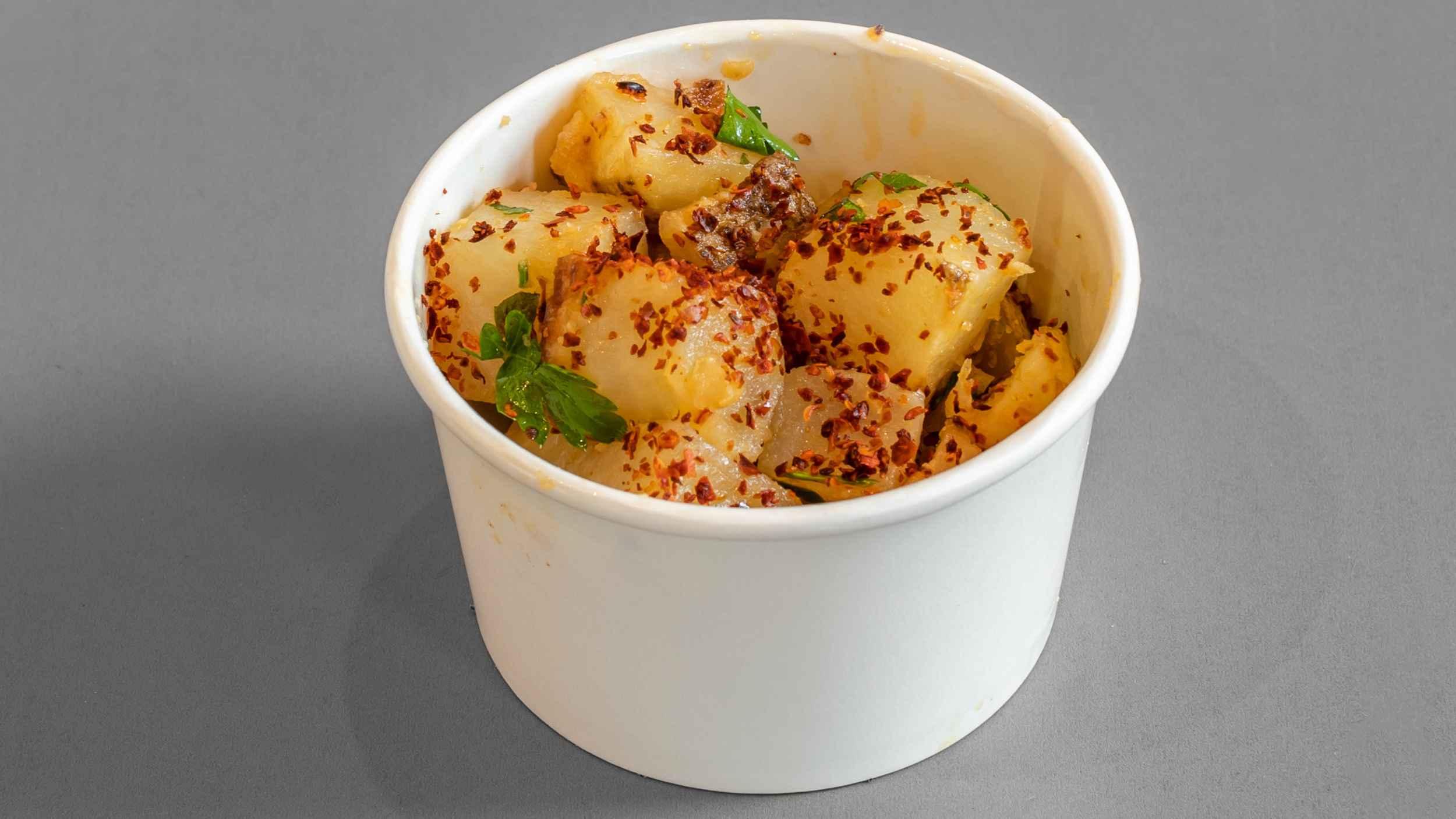 Manousheh: Batata Harra - TP , 1 x $4.00
roasted potato cubes mixed with garlic, cilantro, lemon juice, and aleppo pepper