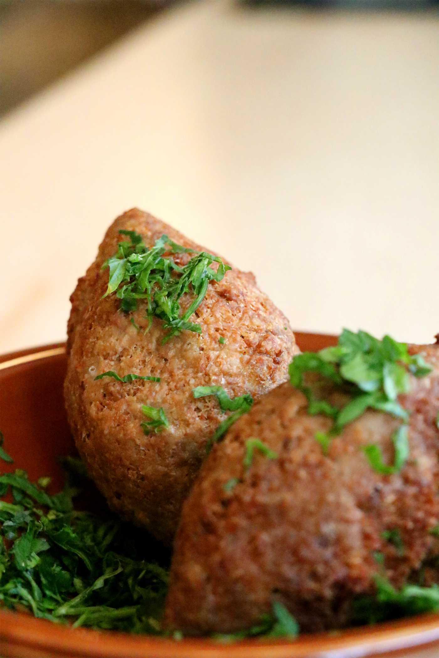 Manousheh: Kibbeh Kras , 1 x $3.00
one large ball of kibbeh filled with ground beef and onion.
