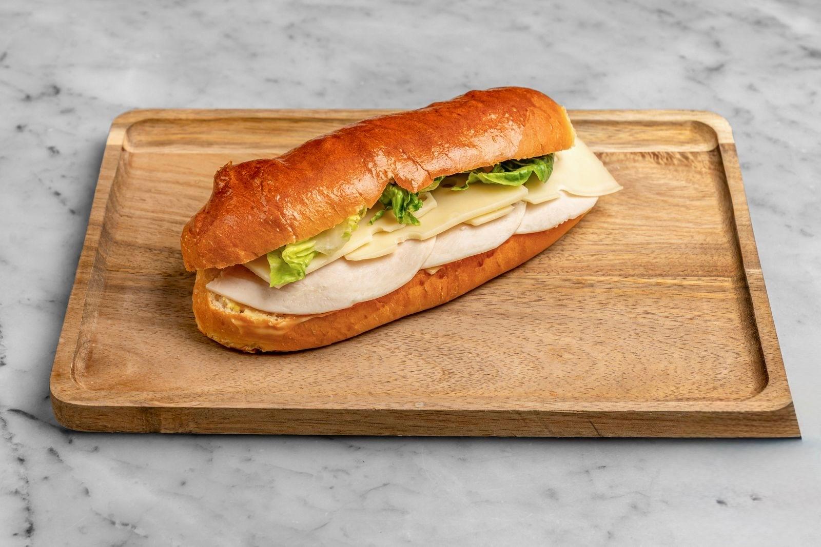 Aux Merveilleux de Fred - West Village: Turkey & Swiss Brioche Sandwich, 1 x $8.80
Our signature Brioche bun filled with finely sliced Turkey and Swiss cheese, and complemented with salad and a mayo mustard mix. A moist, soft and balanced sandwich where bread is a star!
