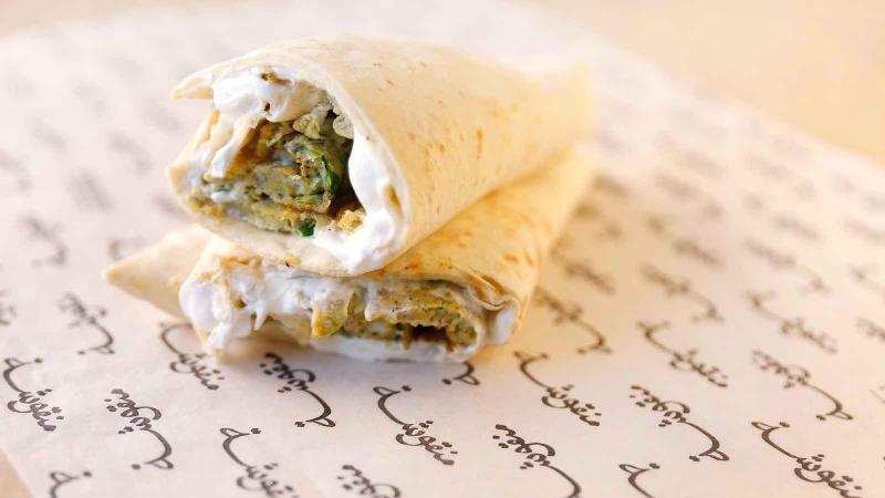 Manousheh: Ijjeh - TP , 2 x $10.00
Parsley and scallion omelette baked on our flatbread and served with hummus or labneh