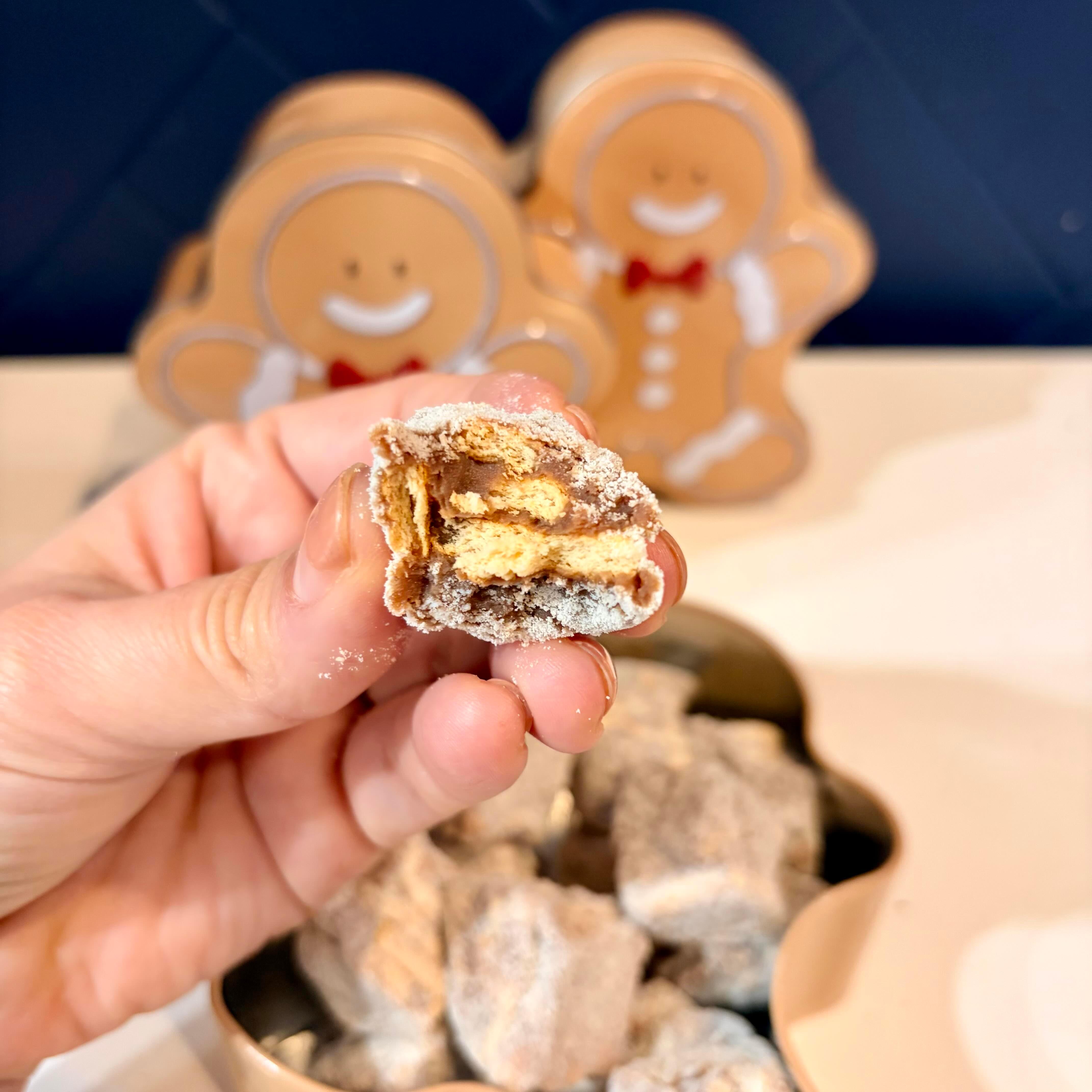 Brigadeiro Bakery: Gingerbread Man Palha Tin , 1 x $22.00
The cutest holiday treat you'll find this season. Our mini palhas arrive in an adorable gingerbread man-shaped tin that's almost too charming to open (but trust us, you'll want to).

What Are Palhas?
Meet Brazil's best-kept secret: palhas (pronounced "PAL-yas") are delicate milk cookies layered with rich, creamy chocolate. Light, crispy, and impossibly addictive, each bite delivers the perfect balance of cookie crunch and smooth chocolate. One taste and you'll understand why they're a beloved treat across Brazil.

What Makes This Special
The Palhas - Bite-sized mini versions of our classic palhas, perfect for snacking, sharing, or sneaking one (or five) throughout the day. Each piece offers that satisfying crunch followed by smooth chocolate bliss.
The Tin - A whimsical gingerbread man-shaped container that doubles as holiday décor. Place it on your desk, coffee table, or kitchen counter and watch it spark joy all season long. Once the palhas are gone (and they will be), use it for storing cookies, candies, or holiday treasures year after year.

Perfect For
Stocking stuffers with a gourmet twist
Secret Santa gifts under $25
Adding charm to your holiday coffee table
Teachers, neighbors, and "thinking of you" gifts
Anyone who loves discovering new treats
Collectors of adorable tins
Give deliciously cute this holiday season.
Limited edition - available only while supplies last. Once these gingerbread tins are gone, they're gone until next year.