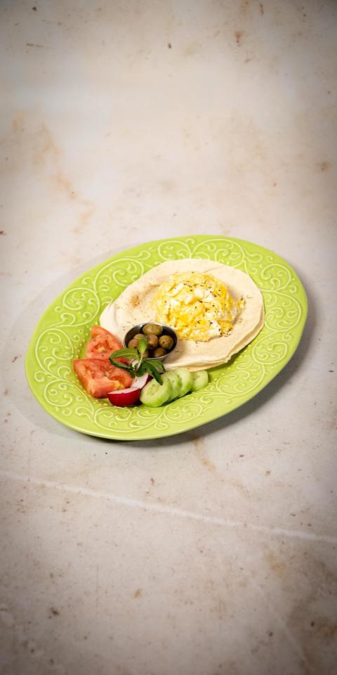 SALMA EAST VILLAGE: Eggs Your Way, 1 x $9.50
3 eggs (your choice of scrambled or sunny side up) on pita, with tomatoes, cucumbers, and olives