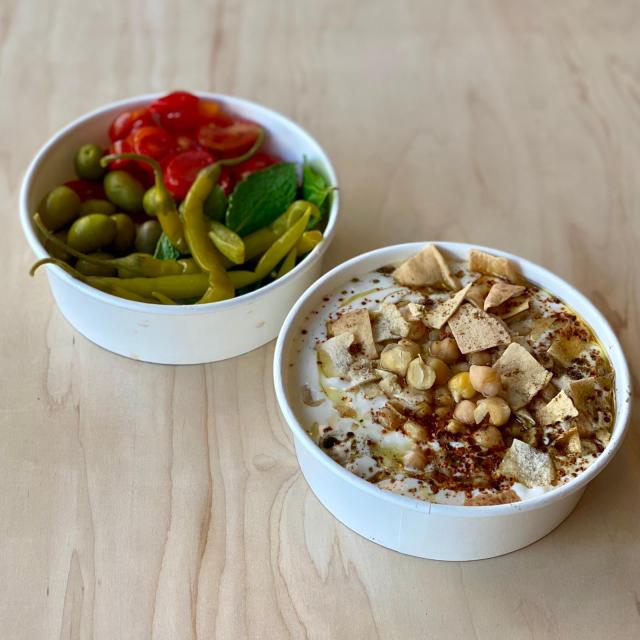 Manousheh: Hummus Fatteh, 1 x $13.00
chickpeas, garlic, lemon juice, cumin, toasted bread served in yogurt tahini and olive oil