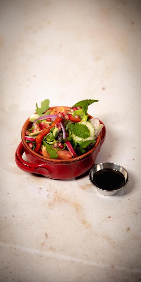 SALMA EAST VILLAGE: Fattouch Salad, 1 x $12.50
Rocca, lettuce, purslane, tomatoes, cucumbers, freshly squeezed lemon juice, virgin olive oil, a hint of garlic, & pomegranate syrup