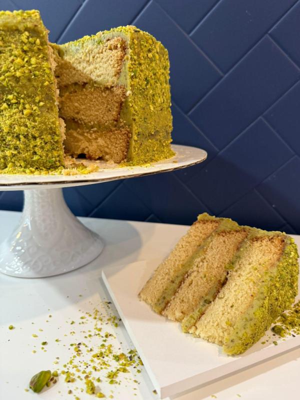 Brigadeiro Bakery: Pistachio Brigadeiro Cake, 1 x $175.00
Vanilla Cake with Pistachio Brigadeiro
A light and flavorful vanilla cake layered with smooth pistachio brigadeiro filling and frosting, finished with a coating of finely crushed pistachio nuts. The combination of soft cake and creamy filling offers a unique texture and taste that's both satisfying and balanced.

Shelf Life: 7 days (keep in a cool, dry place)

 Allergens: Contains gluten and tree nuts (pistachio)

Perfect for parties or a simple treat, this cake brings a fresh twist to a classic favorite.