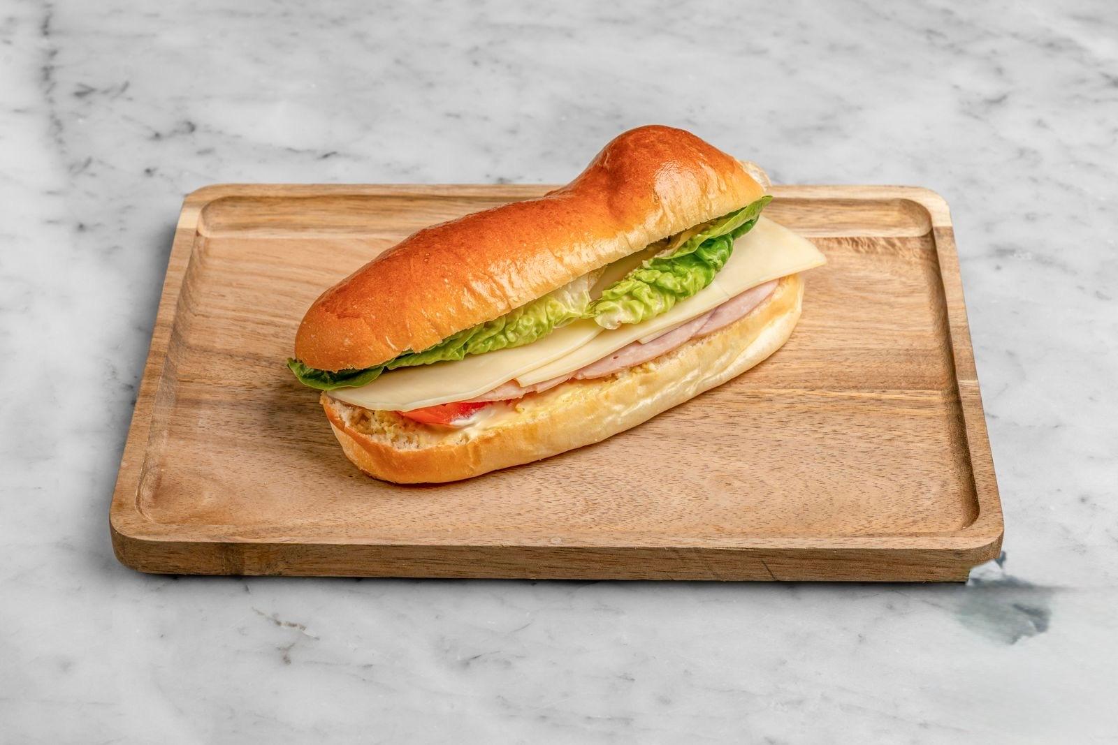 Aux Merveilleux de Fred - West Village: Ham & Swiss Brioche Sandwich, 1 x $8.80
Our signature Brioche bun filled with Parisian ham and Swiss cheese and complemented with salad and mayonnaise. A moist, soft and balanced sandwich where bread is a star!
