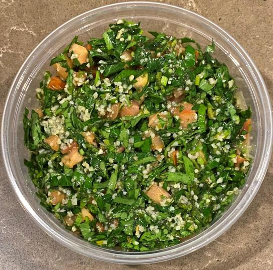 Casba Food And Pastries: Tabbouleh, 1 x $8.00
Chopped parsley, with tomatoes, mint, onion, bulgur, olive oils, and seasonings. Served with a side of pita bread.