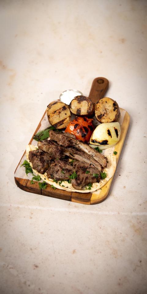 SALMA EAST VILLAGE: Grilled Lamb Chop Platter, 1 x $38.50
Lean lamb chops with our delicious house marinade served with grilled potatoes