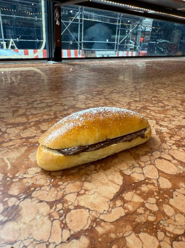 Aux Merveilleux de Fred - Midtown: Nutella Cramique , 1 x $6.49
Small plain brioche with a layer of Nutella spread in the middle.
