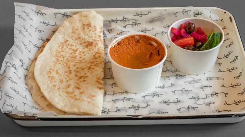 Manousheh: Muhammara Platter - TP , 1 x $11.00
Roasted red pepper dip with garlic, walnut, and pomegranate molasses