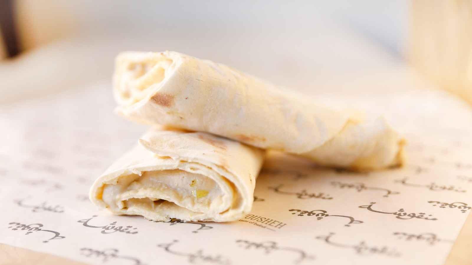 Manousheh: Hummus Manousheh - TP , 1 x $7.00
Chickpea paste spread on our freshly baked flatbread