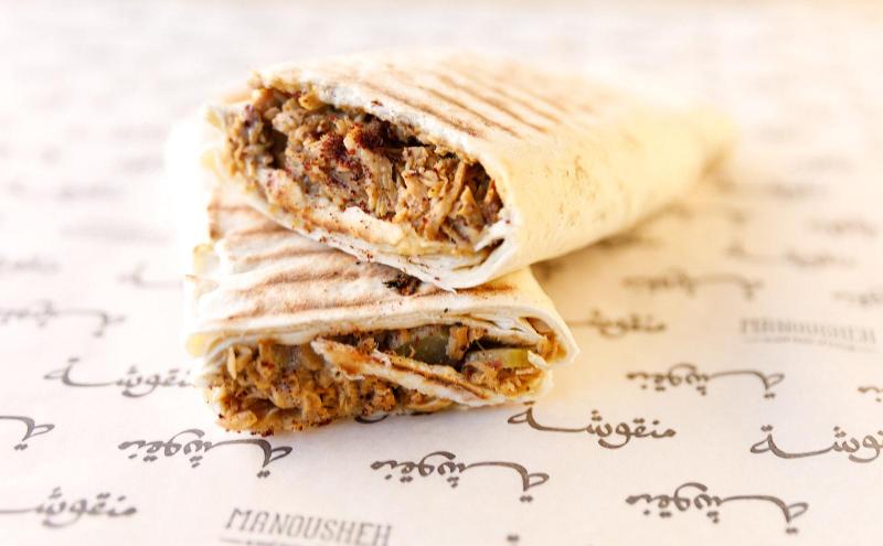 Manousheh: Chicken Musakkhan, 2 x $13.00
roasted chicken served with caramelized onions, sumac, pickles, and ‘thoum’ on our freshly baked flatbread