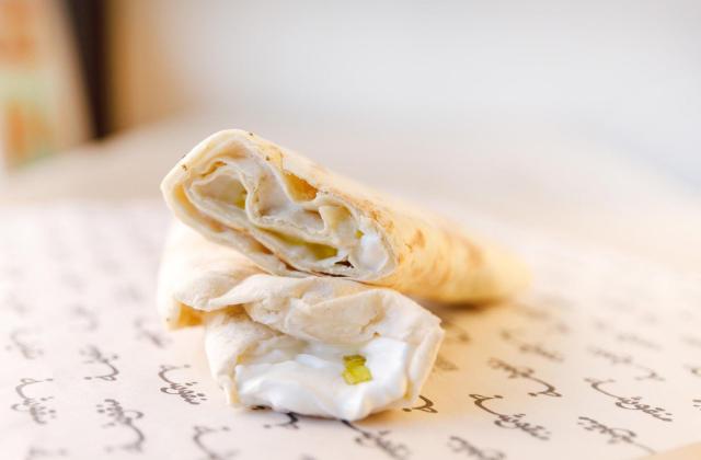 Manousheh: Labneh Manousheh, 1 x $7.00
traditional thick and creamy yogurt spread on our freshly baked flatbread