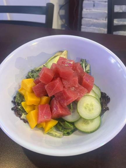 Lobstah On A Roll: Fresh Ahi Tuna Poke Bowl Seared, 1 x $17.90
Fresh Ahi tuna poke bowl paired with creamy avocado, crisp cucumber, juicy mango, and spring onions, served on a bed of mixed greens and sushi rice, garnished with a sesame vinaigrette.