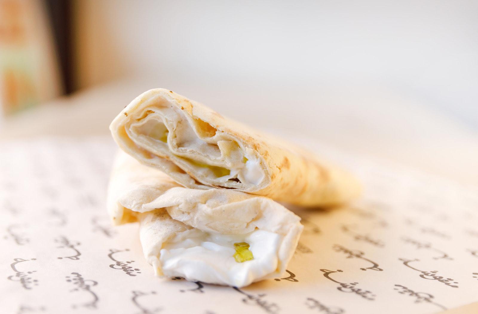 Manousheh: Labneh Manousheh olives, 1 x $7.00
traditional thick and creamy yogurt spread on our freshly baked flatbread