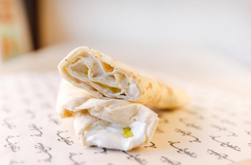 Manousheh: Labneh Manousheh olives, 1 x $7.00
traditional thick and creamy yogurt spread on our freshly baked flatbread