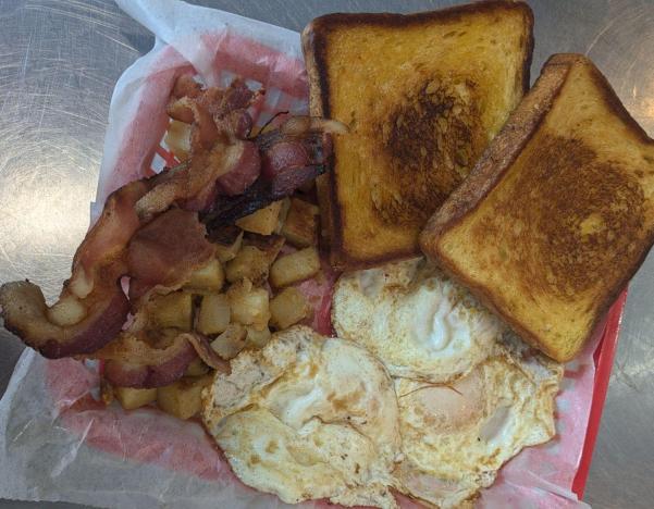 Lobstah On A Roll: Three Eggs Over medium to well 
Crispy bacon, 1 x $12.95
Three farm-fresh eggs cooked to your preference, served with a side of golden hash browns and buttered toast, and choice of meat