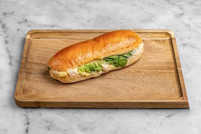 Aux Merveilleux de Fred - West Village: Mimosa Sandwich, 1 x $8.80
Our signature Brioche bun filled with Parisian ham mustard mayonnaise complemented with salad and eggs. A moist, soft and balanced sandwich where bread is a star!