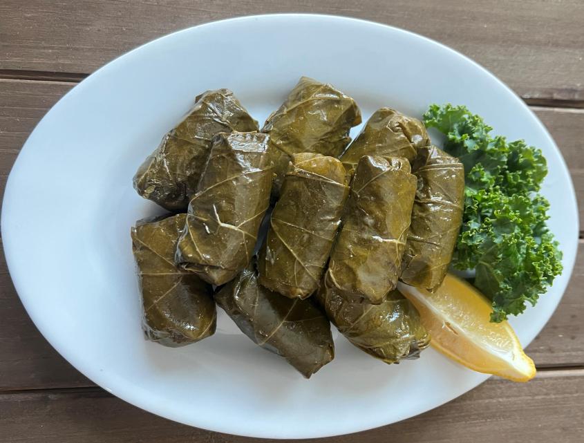 Casba Food And Pastries: Grape Leaves, 1 x $11.00
Grape leaves stuffed with brown rice, herbs, pomegranate, olive oil and seasonings. Served with a side of pita bread.