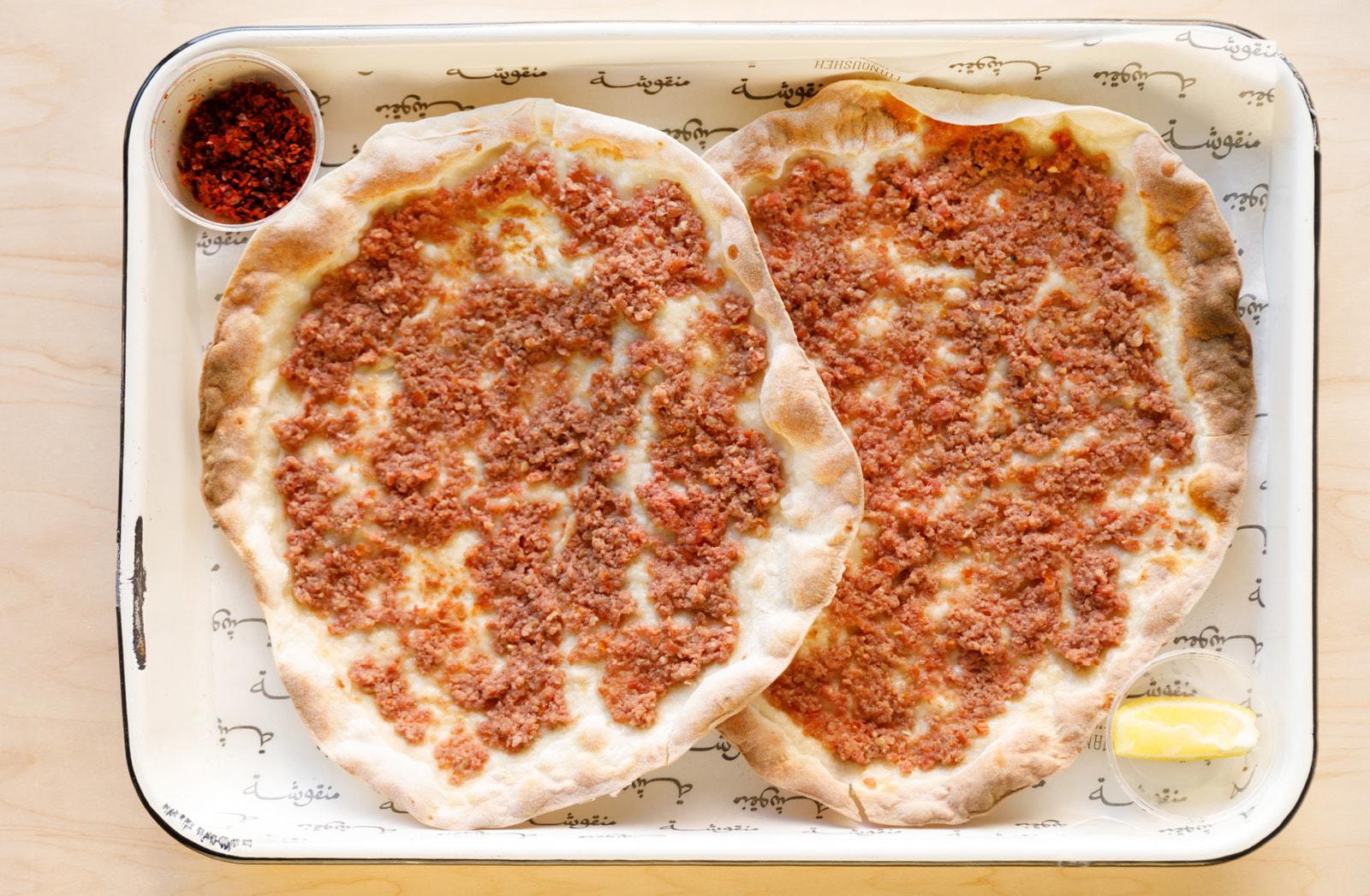 Manousheh: Combo bi ajine IN STORE, 1 x $13.00
2 for $12 special on lahem bi ajine and sujuk bi ajine.  Get two lahmeh, two sujuk, or one of each.