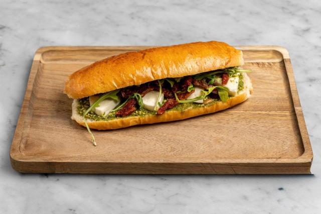 Aux Merveilleux de Fred - Midtown: Mozzarella, Pesto & Sundried Tomatoes Brioche Sandwich, 1 x $8.80
Our signature Brioche bun filled with tasty Mozzarella, Pesto and Sundried Tomatoes, and complemented with Arugula. A moist, soft and balanced sandwich where bread is a star!