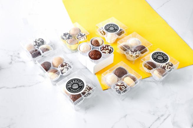Brigadeiro Bakery: Gift Box 4 brigadeiros Classic Chocolate, Dulce de Leche, Coconut, and White Crunch, 10 x $12.00
4 Brigadeiros in a Gift Box / up to 2 flavors minimum of 20 boxes

Match your brand: add your logo and message extra $1.00 per box
Gift Boxes with ribbon 10 minimum for custom order
Rush Fee 15% of total order

IMPORTANT: 
*Local delivery available in New York City. Custom packaging available. 10 Days notice required Payment is due upon receipt of invoice. Once paid, your order is confirmed.