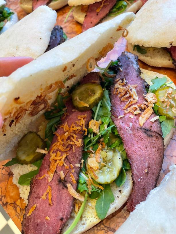 Aux Merveilleux de Fred - Midtown: Pastrami Sandwich, 1 x $9.50
Our signature Brioche bun filled with Parisian ham and Swiss cheese and complemented with salad and mayonnaise. A moist, soft and balanced sandwich where bread is a star!