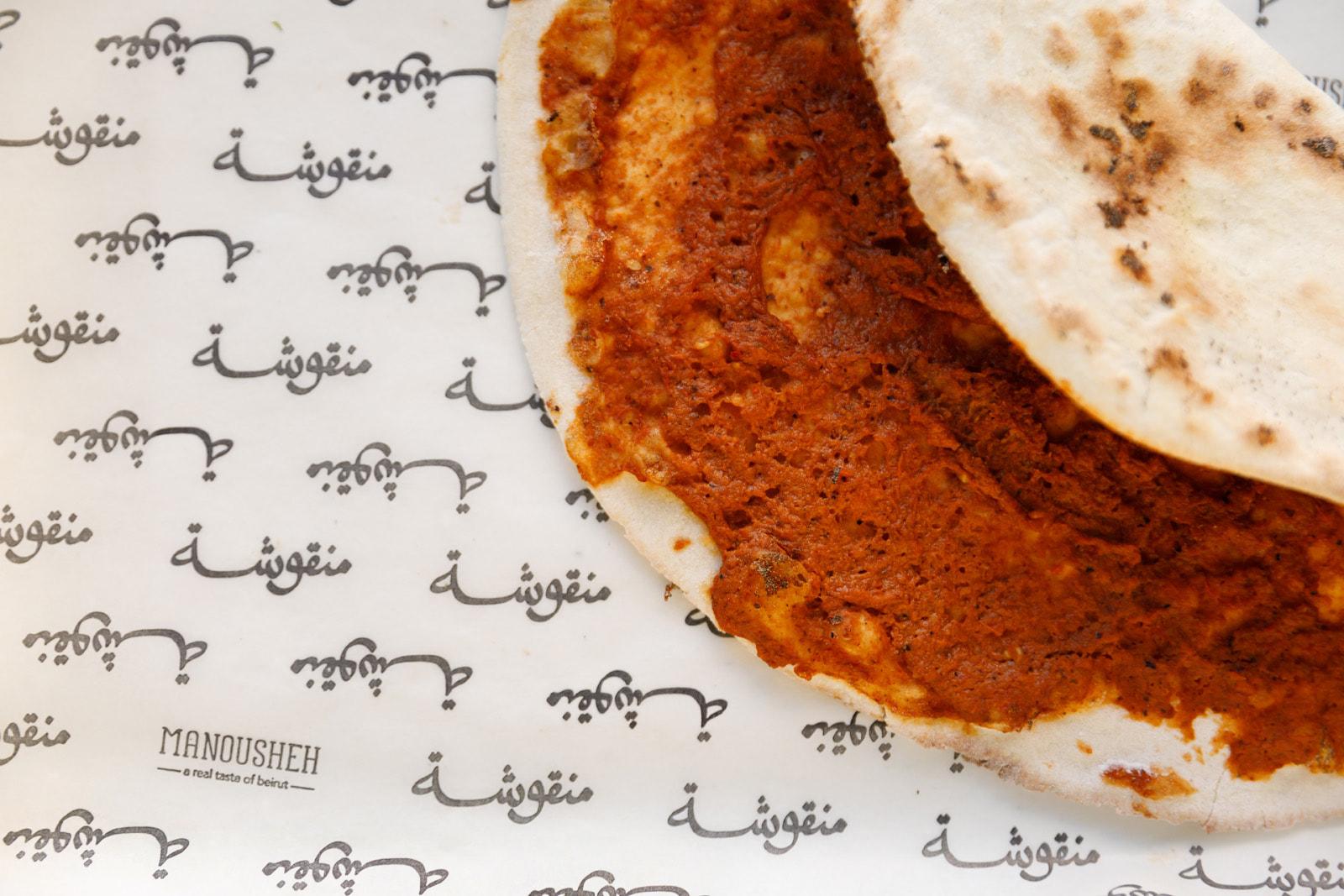 Manousheh: Muhammara Manousheh, 1 x $12.00
roasted red pepper dip with garlic, walnut, and pomegranate molasses spread on our freshly baked flatbread