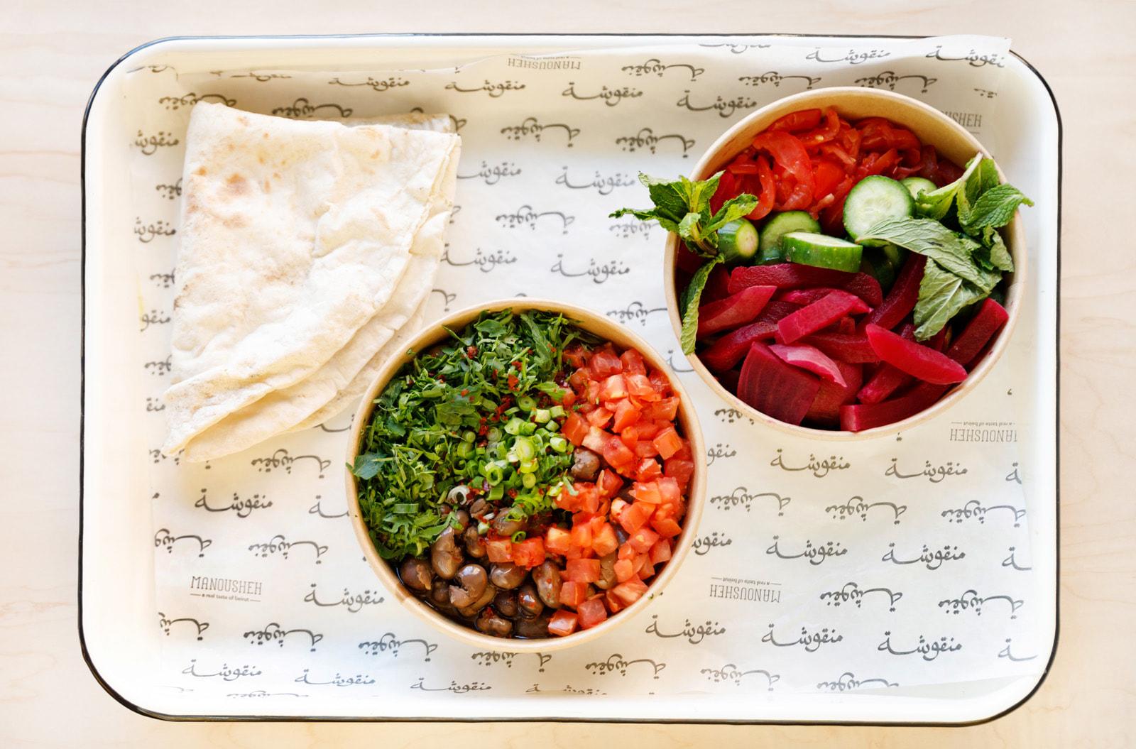 Manousheh: Foul, 1 x $12.00
slow-cooked fava beans mixed with garlic, 7 spice, and lemon juice, then topped with tomato, parsley, scallion, and drizzled with olive oil