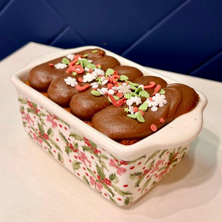 Brigadeiro Bakery: Holiday Carrot Cake, 1 x $27.00
Discover Brazil's most beloved cake in our festive holiday edition. Our Bolo de Cenoura (Brazilian Carrot Cake) arrives baked to perfection in a gorgeous ceramic holiday tray that becomes a cherished part of your celebrations for years to come.
A Brazilian Classic, Reimagined for the Holidays
This isn't your typical carrot cake. Brazilian bolo de cenoura is wonderfully moist and beautifully light - a perfect canvas for our signature move: a generous layer of creamy chocolate brigadeiro frosting that transforms each slice into pure magic.
What Makes It Special
The Cake - Made with fresh carrots blended right into the batter for incredible moisture and a subtle sweetness that's never too heavy. Our recipe creates a tender, almost cloud-like texture that melts on your tongue.
The Brigadeiro Topping - Forget cream cheese frosting. We crown this beauty with our famous chocolate brigadeiro - that rich, fudgy, impossibly creamy Brazilian chocolate that's somewhere between frosting and ganache, but better than both.
The Keepsake Tray - Your cake arrives in a stunning ceramic holiday tray adorned with festive designs. Once you've savored every last crumb, wash it and use it season after season for serving, baking, or displaying your holiday spreads.
Perfect For
Holiday gatherings and potlucks
Dessert centerpieces that wow
Gifting to hosts and loved ones
Anyone tired of the same old holiday treats
Creating new family traditions
Serves 2 people
A limited-edition holiday exclusive that brings authentic Brazilian sweetness to your seasonal celebrations.