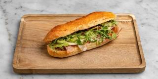 Aux Merveilleux de Fred - Midtown: Prosciutto Brioche Sandwich, 2 x $8.50
Our signature Brioche bun filled with Italian Prosciutto, and complemented with Provolone cheese, Arugula and sun dried tomatoes blended with Olive oil. A moist, soft and balanced sandwich where bread is a star!