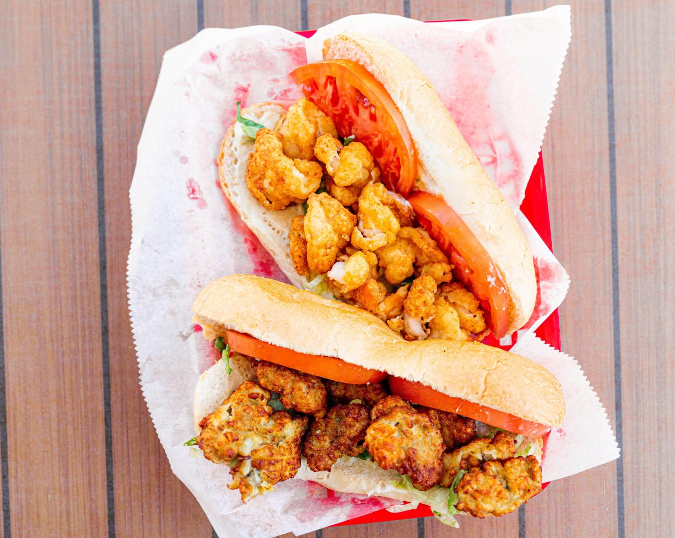 Lobstah On A Roll: The Oyster House Po' Boy Atw, 1 x $15.90
Indulge in the ultimate seafood experience with The Oyster House Poboy - featuring crispy fried oysters, fresh lettuce, juicy tomato, zesty onion, and creamy tartar sauce all nestled in a perfectly grilled roll. Treat yourself to a taste sensation like no other today!
