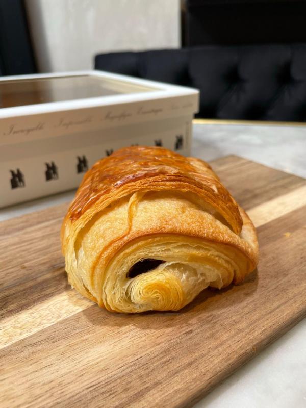 Aux Merveilleux de Fred - Midtown: Chocolate Croissant, 1 x $4.90
Our hand made croissant, rolled with semi-sweet chocolate batons, baked multiple times a day in manhattan for unique freshness.