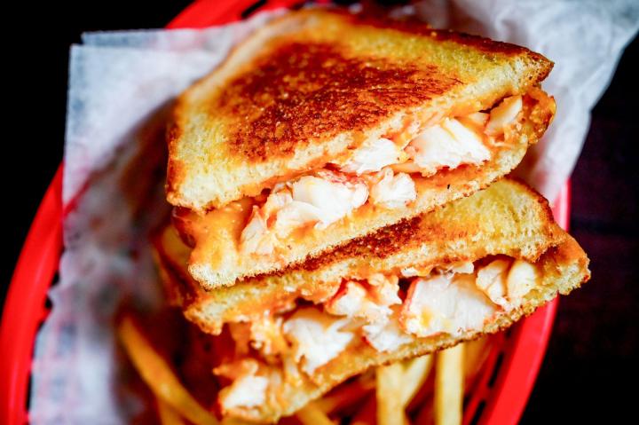 Lobstah On A Roll: Lobstah Grilled Cheese, 2 x $21.90
Indulge in the decadent flavor combination of mouth-watering lobster and cheesy indulgence with our Lobstah Grilled Cheese. It's made with melted cheddar cheese and succulent New England Lobstah meat sandwiched between sourdough bread — a true delight for your taste buds.