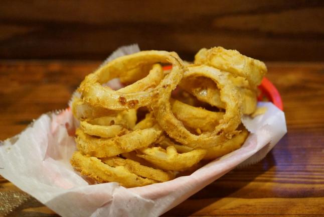 Lobstah On A Roll: Onion Rings, 1 x $6.50
Indulge in the crispy texture and savory flavor of our delectable Onion Rings - the perfect appetizer to kickstart your meal. Treat yourself to a bite of crunchy goodness with every bite, order your Onion Rings now!