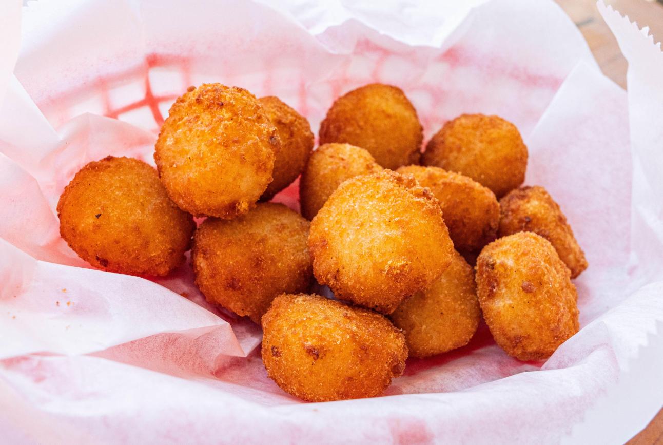 Lobstah On A Roll: Hushpuppies, 1 x $4.50
Indulge in the crispy, golden goodness of hushpuppies, a beloved Southern classic that will transport your taste buds to a realm of pure comfort and satisfaction. Add a side of hushpuppies to your meal today and experience a touch of Southern charm with every bite!