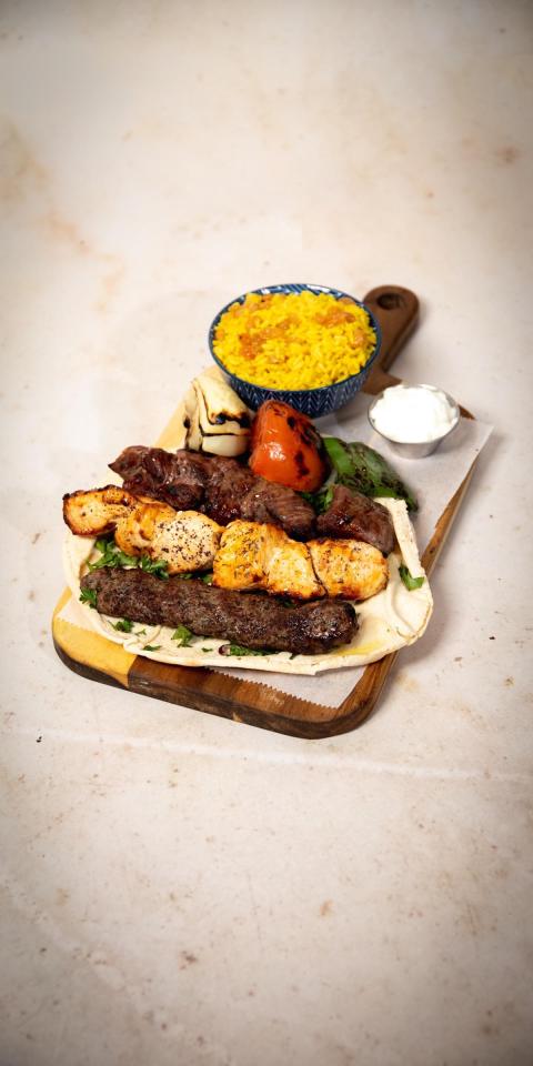 SALMA EAST VILLAGE: Mixed Grill Platter, 1 x $38.50
Beef, Poultry. 1 skewer of grilled veal filet, 1 skewer of shish taouk, & 1 skewer of kabab halabi