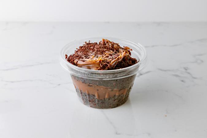 Brigadeiro Bakery: Cake Jar Chocolate , 4 x $10.00
Our most popular cakes conveniently packed so you can treat yourself on the go and anytime.
Chocolate Cake Jar: flour, sugar, cocoa powder, eggs, coconut milk, canola oil, baking powder, baking soda, dark chocolate, milk, corn starch, and chocolate sprinkles
Shelf life: 7 days refrigerated