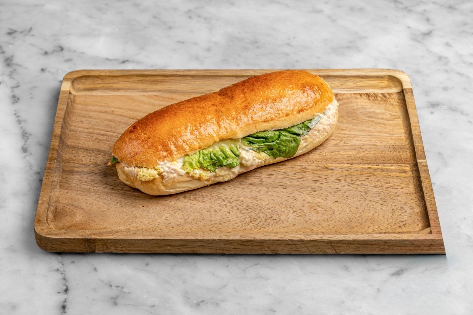 Aux Merveilleux de Fred - West Village: Mimosa Sandwich, 1 x $8.80
Our signature Brioche bun filled with Parisian ham mustard mayonnaise complemented with salad and eggs. A moist, soft and balanced sandwich where bread is a star!